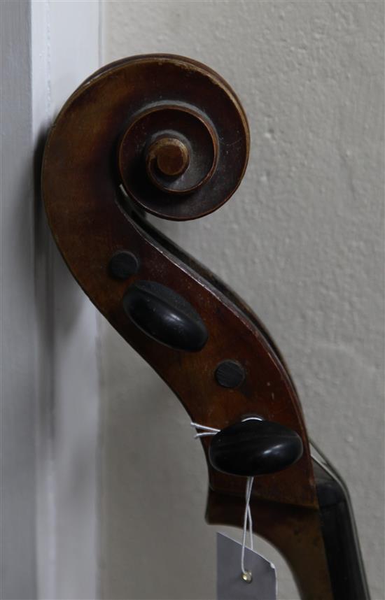 An early 20th century cello, probably French, body 29.5in., length overall 49in.